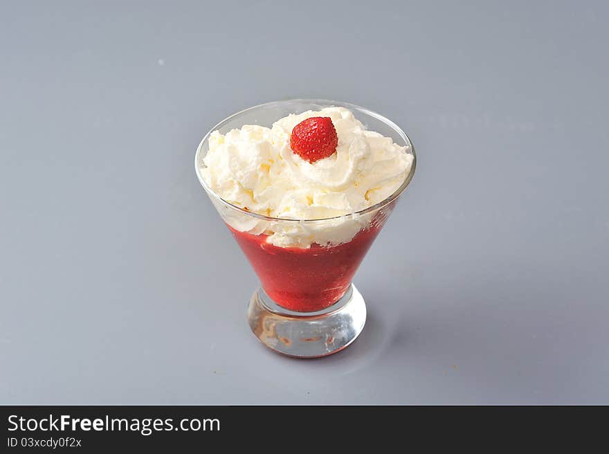 Strawberry puree with wipped cream. Strawberry puree with wipped cream