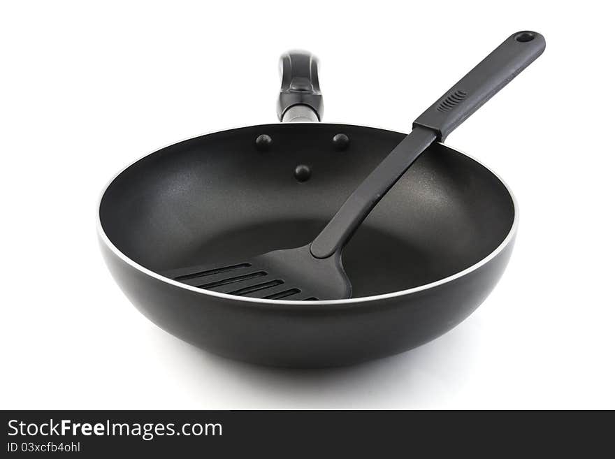 Pan with handle and Spade of frying pan on white background