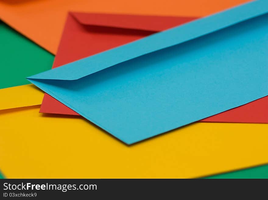 A pile of colored envelopes background