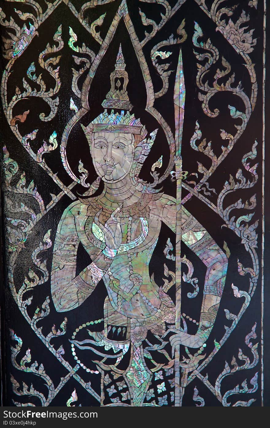 Beautiful Decorate Art on Black door at Wat Mai Sam Ran, Chonburi Thailand