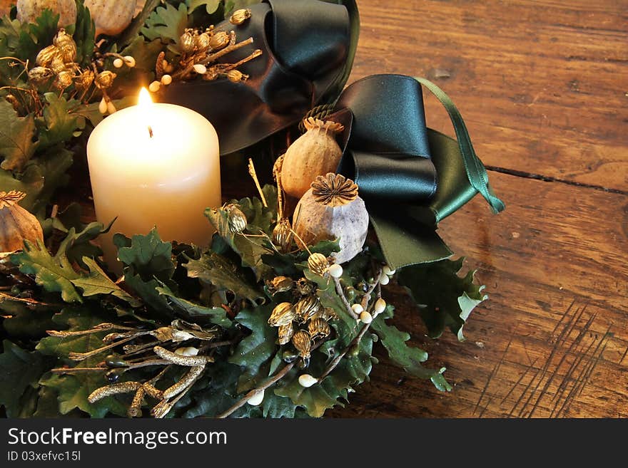 Christmas decoration and candle light on wooden background. Christmas decoration and candle light on wooden background