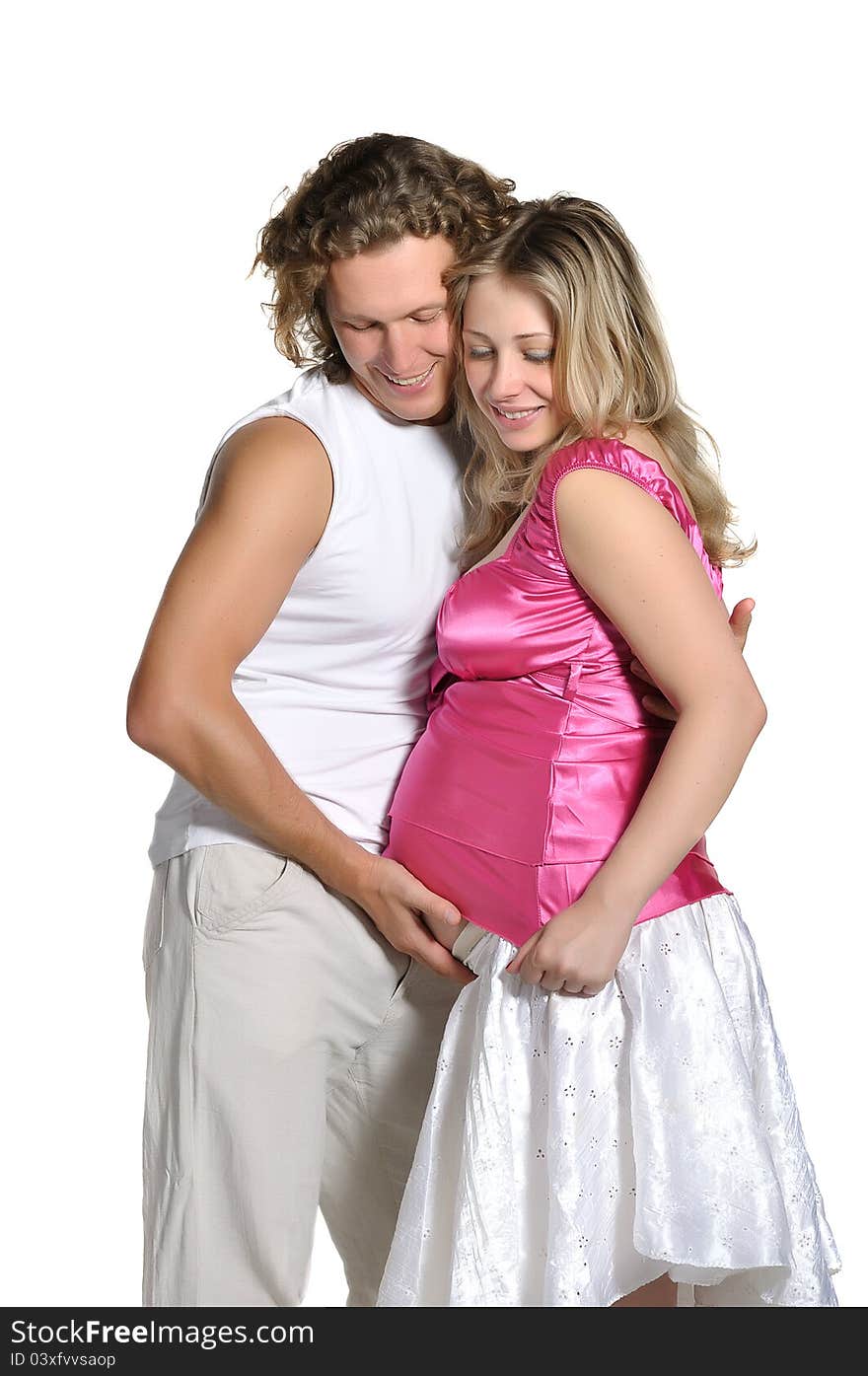 Fashion young pregnant couple expecting a baby. Fashion young pregnant couple expecting a baby