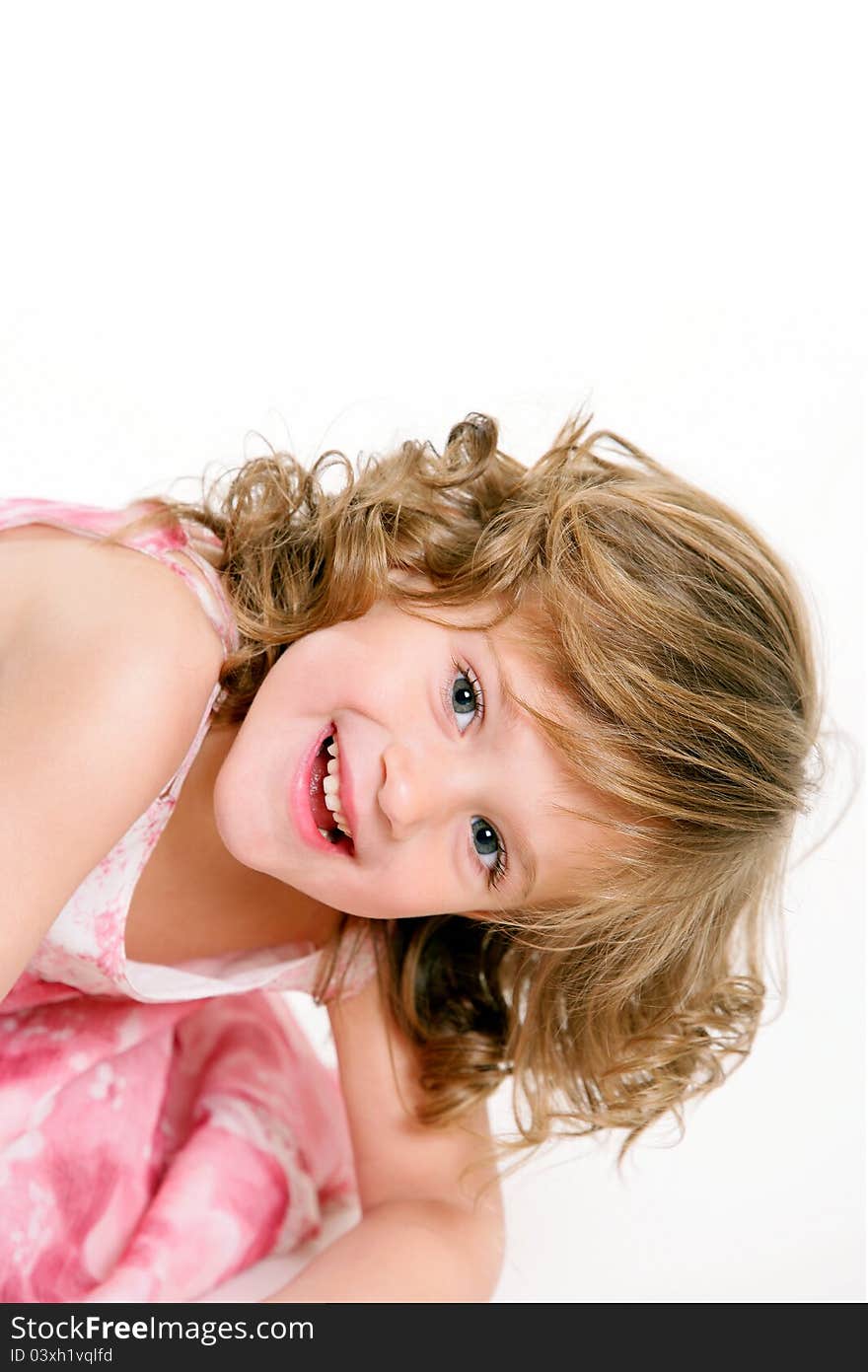 Young girl smiling on isolated white background