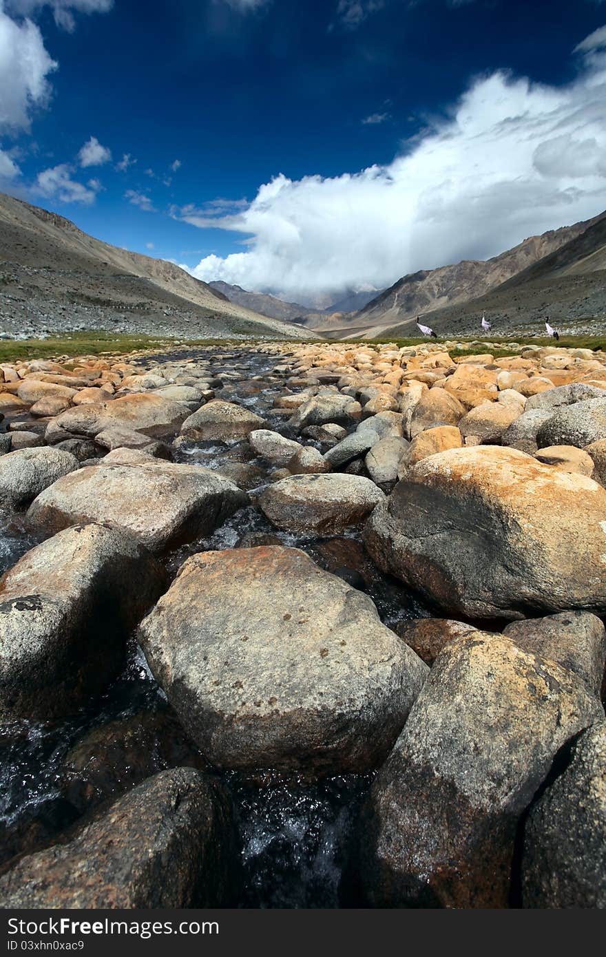 Landscape with river, stones and birds in Himalayas.Ladakh. India. Landscape with river, stones and birds in Himalayas.Ladakh. India