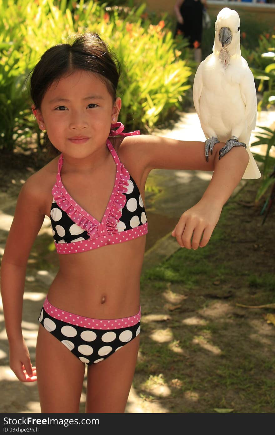 Chinese Girl Holding Bird