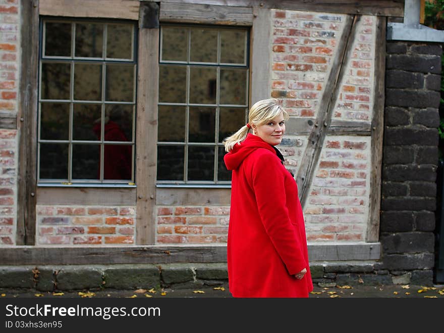 Adorable girl with blond hairs enjoying sunny autumn day. Adorable girl with blond hairs enjoying sunny autumn day