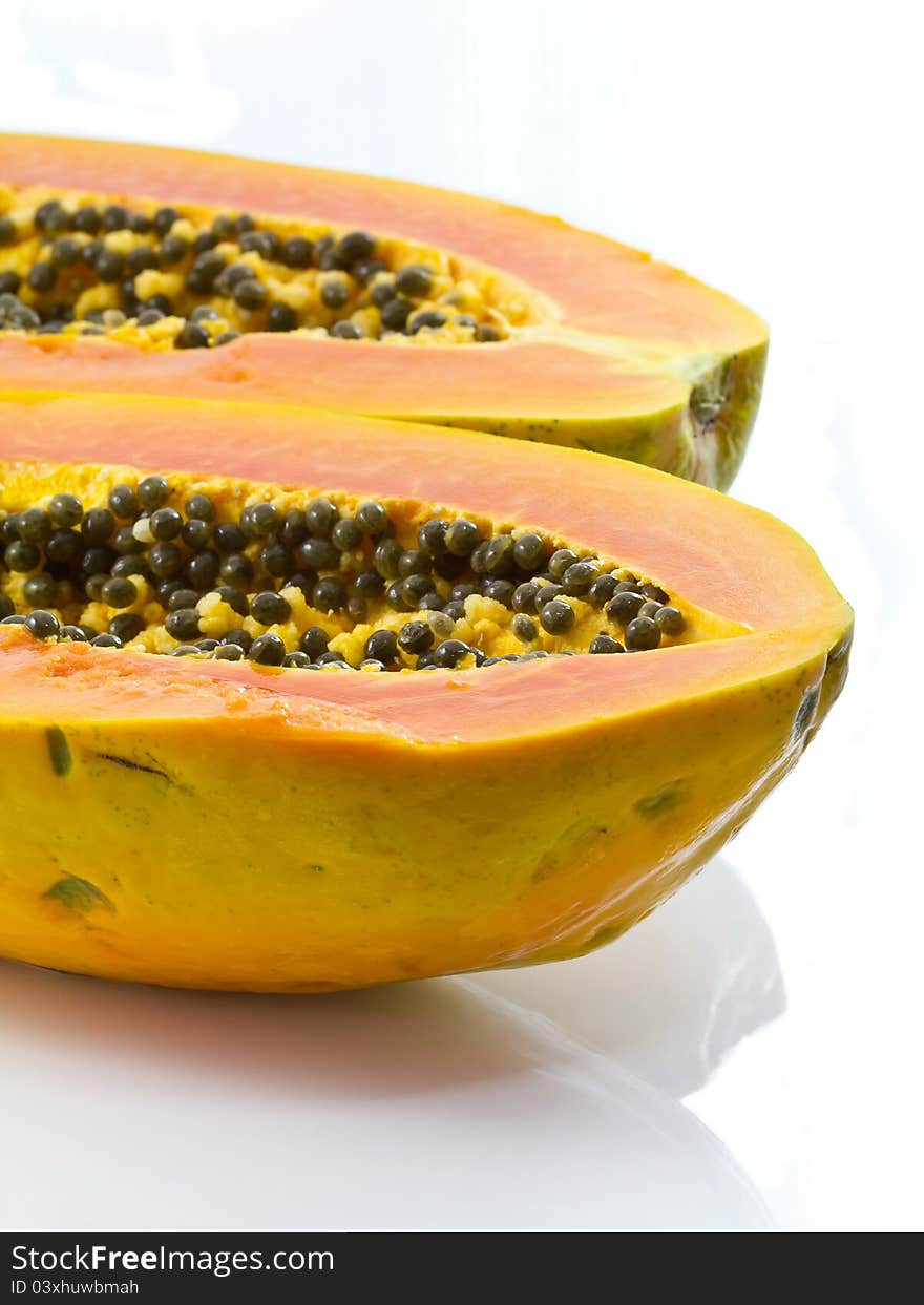 Ripe papaya on white background