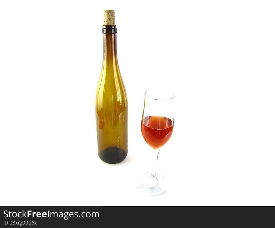 Bottle and glass of red wine isolated on a white background