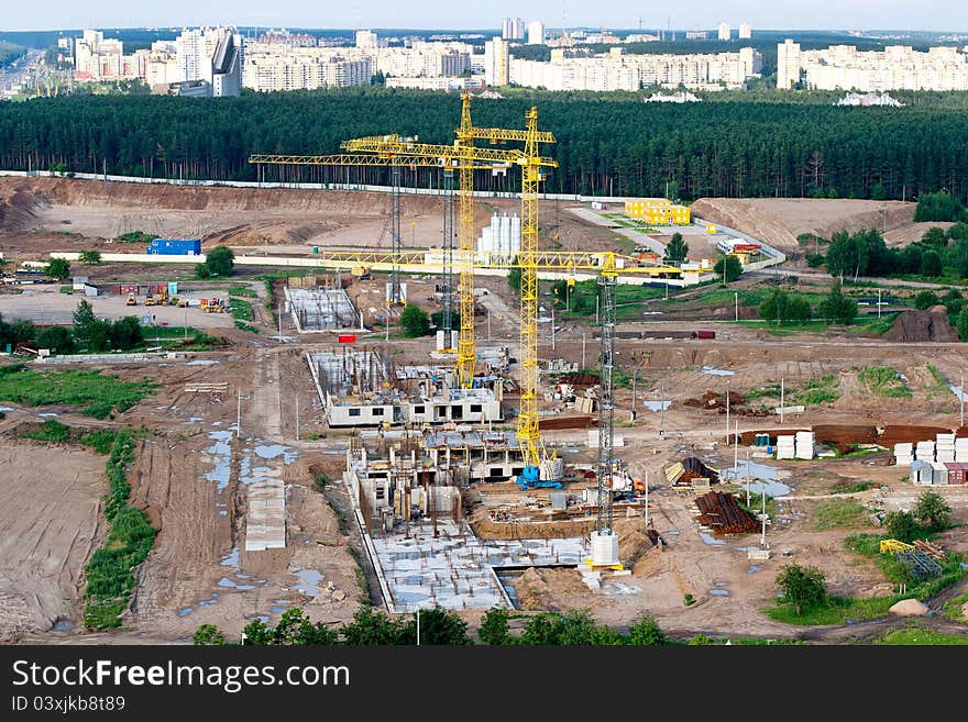 Birds eye view of the large construction site. Birds eye view of the large construction site