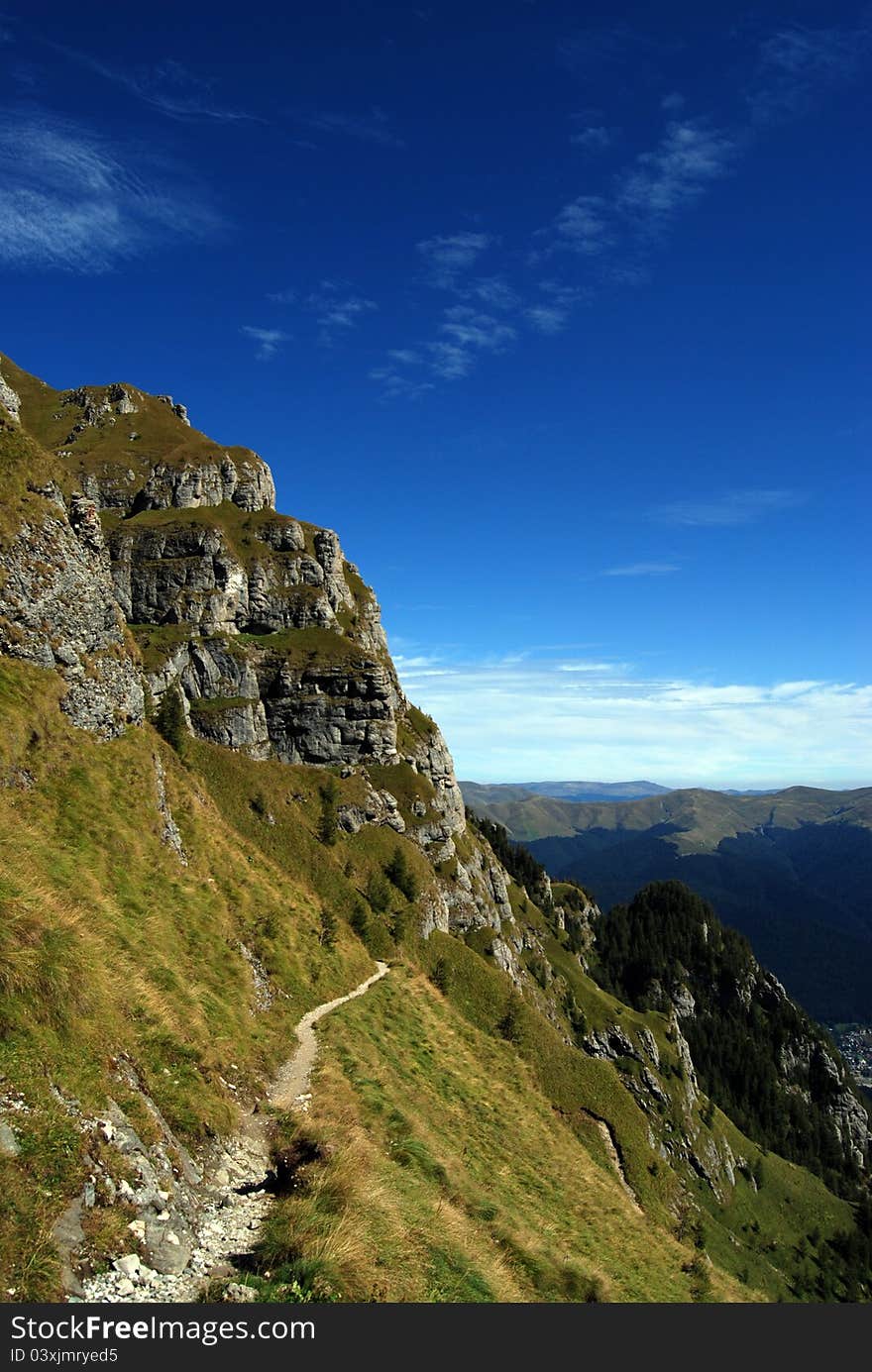 Dangerous footpath in the heights of a mountain