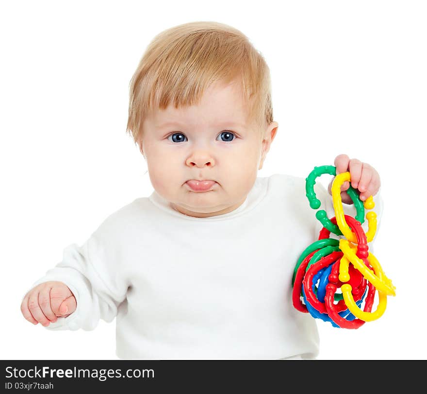 Cute little child playing with colored toys, isolated over white background. Cute little child playing with colored toys, isolated over white background