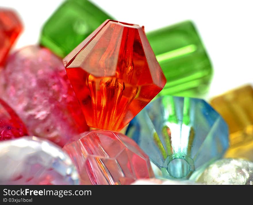 Colorful beads on white background