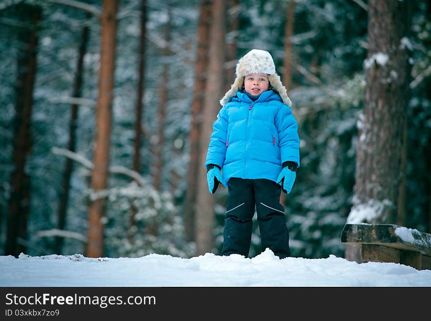 Portrait of a little boy playing outdoors