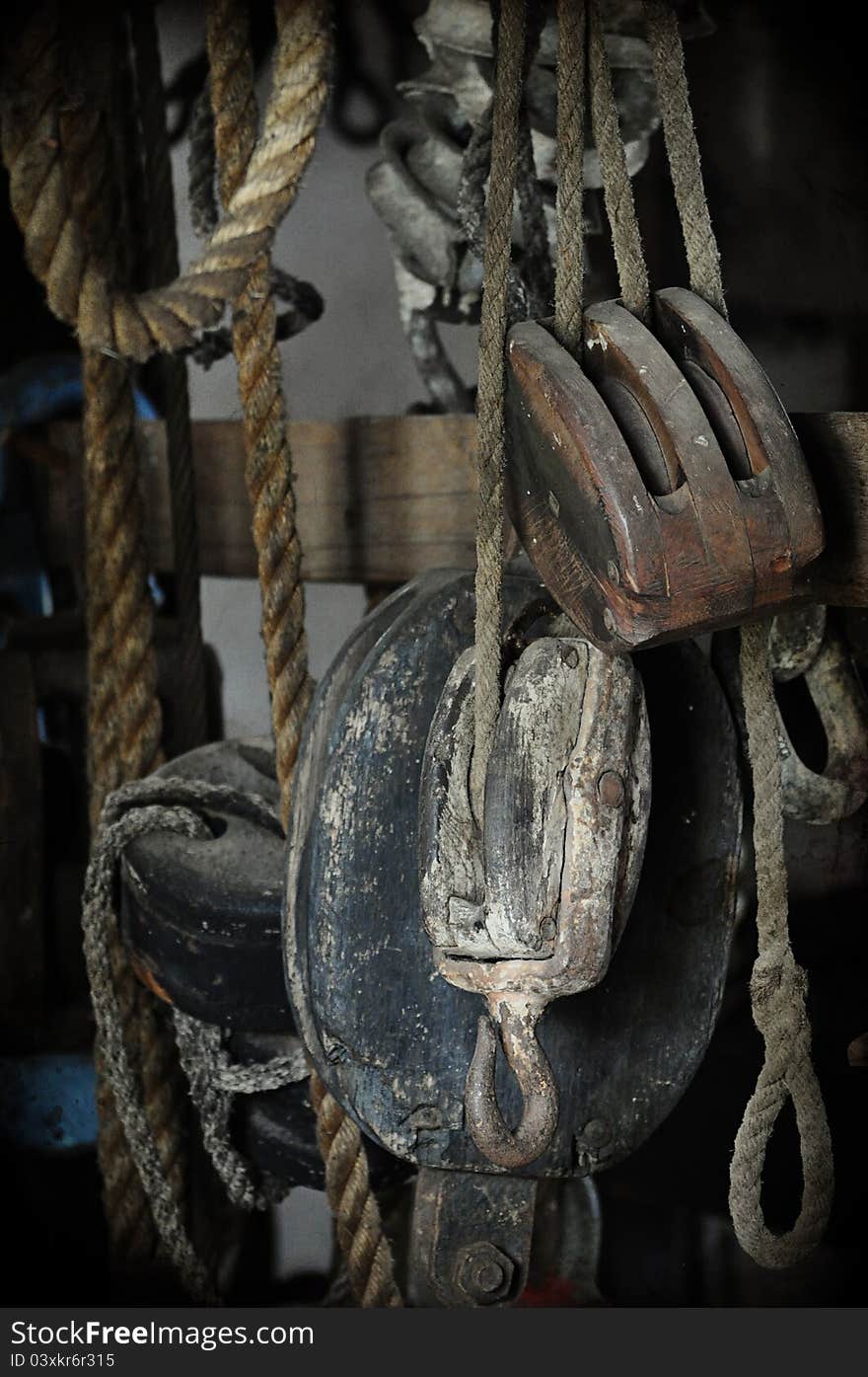 Ropes and old ship rigging parts in storage. Ropes and old ship rigging parts in storage.