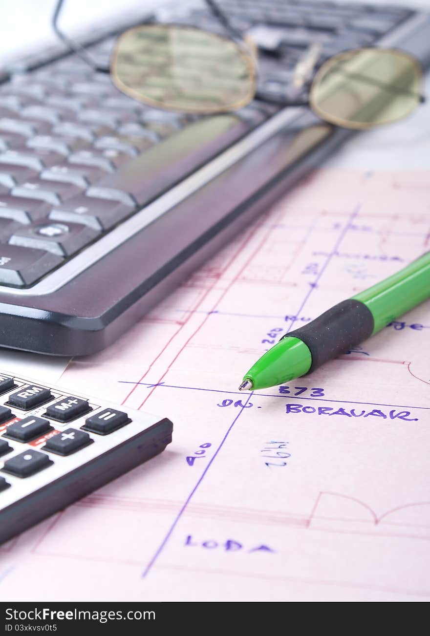 Pencil and a calculator on the desk. Pencil and a calculator on the desk