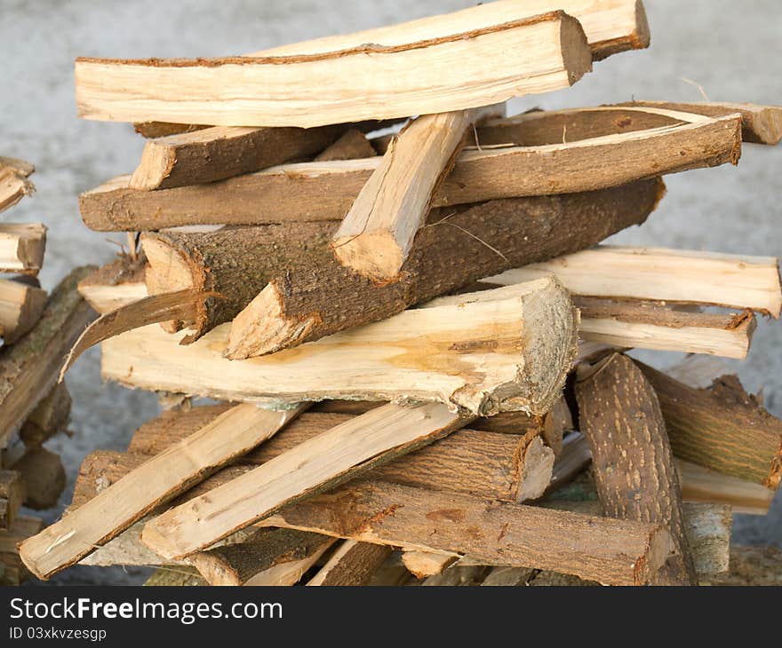 Natural raw chopped firewood pile. Natural raw chopped firewood pile