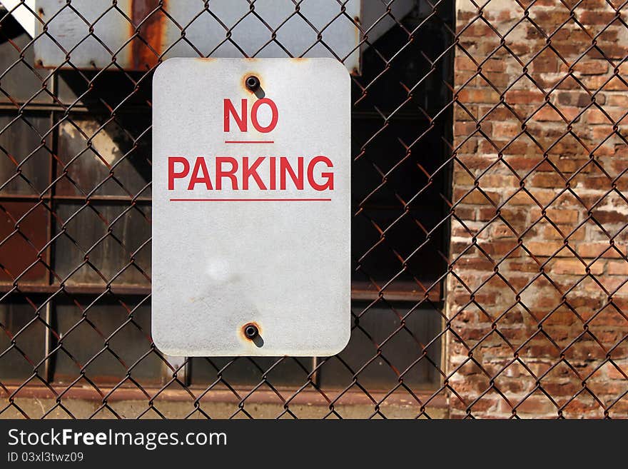 Sign on fence