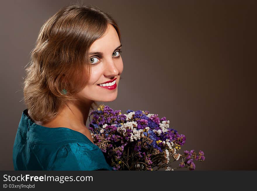 Smiling Woman With Flowers