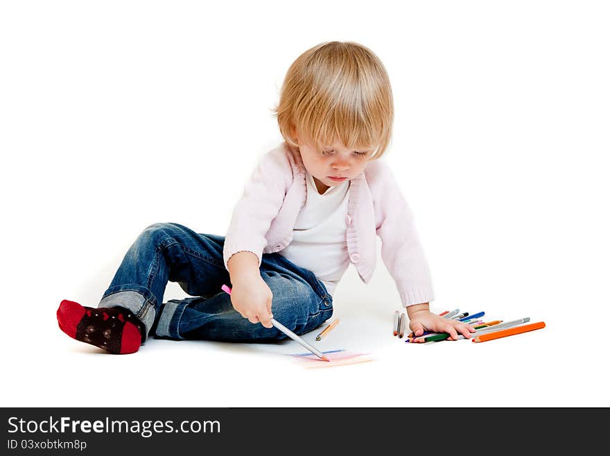 Cute little girl painting on the floor. on white. Cute little girl painting on the floor. on white