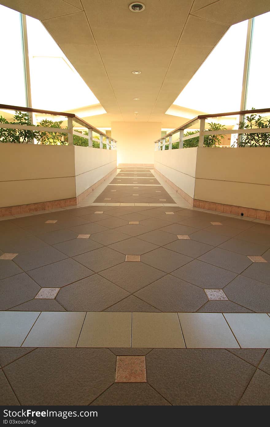 Long corridor between building decorated with beautiful tiles