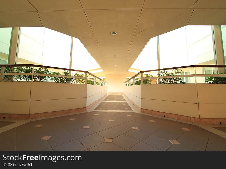 Long corridor between building decorated with beautiful tiles