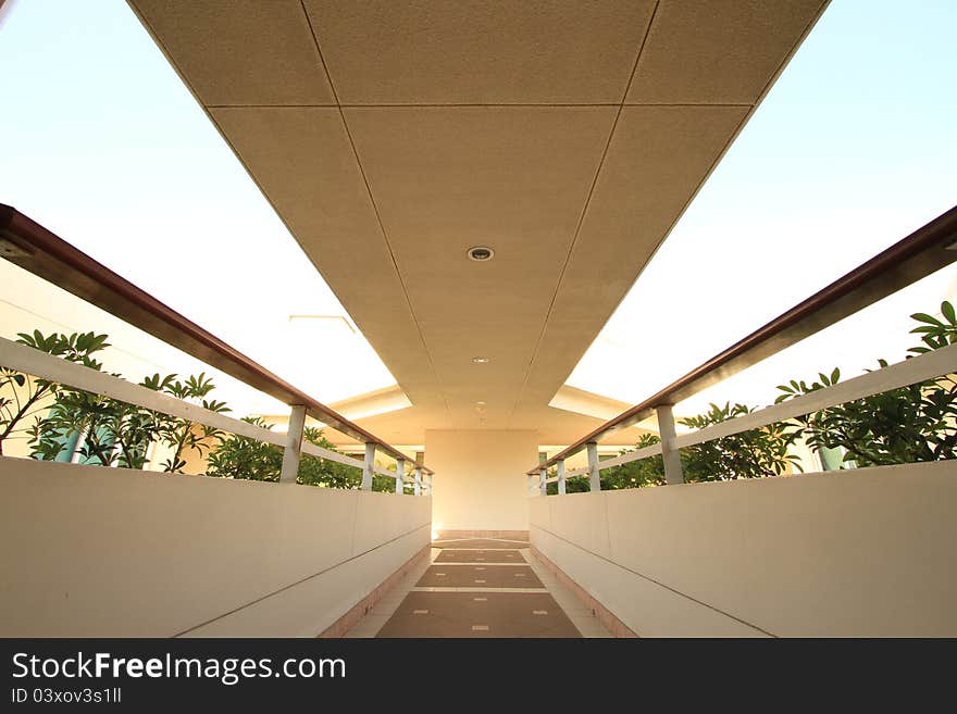 Long corridor between building decorated with beautiful tiles