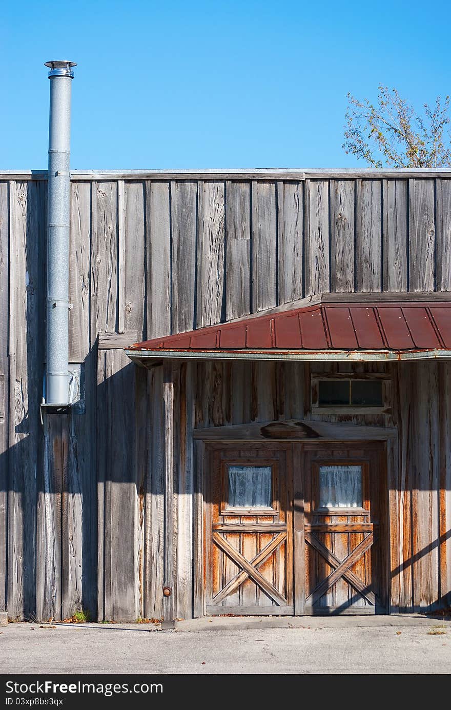 Old wooden store building in the morning sun