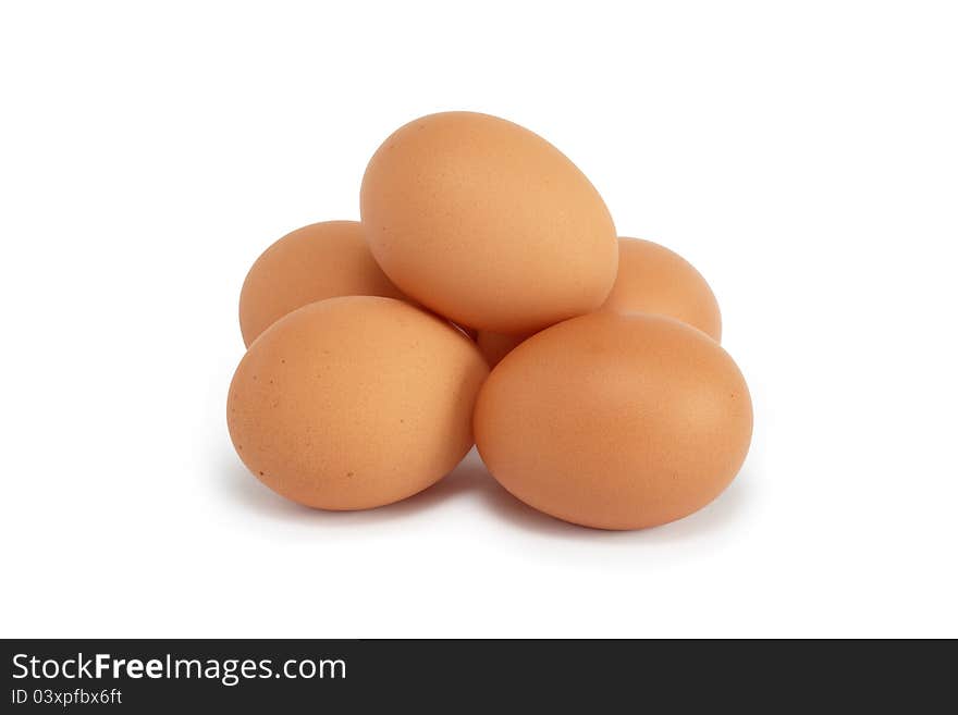 Small heap of raw eggs on white background.  with clipping path