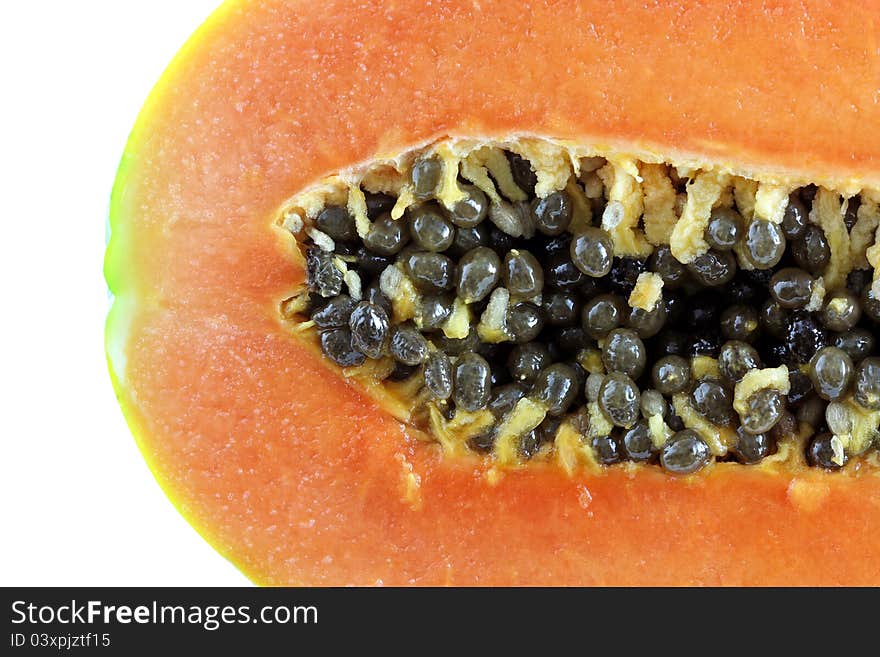 Closeup photo of Holland papaya (grown in Asia) on a white background. Closeup photo of Holland papaya (grown in Asia) on a white background