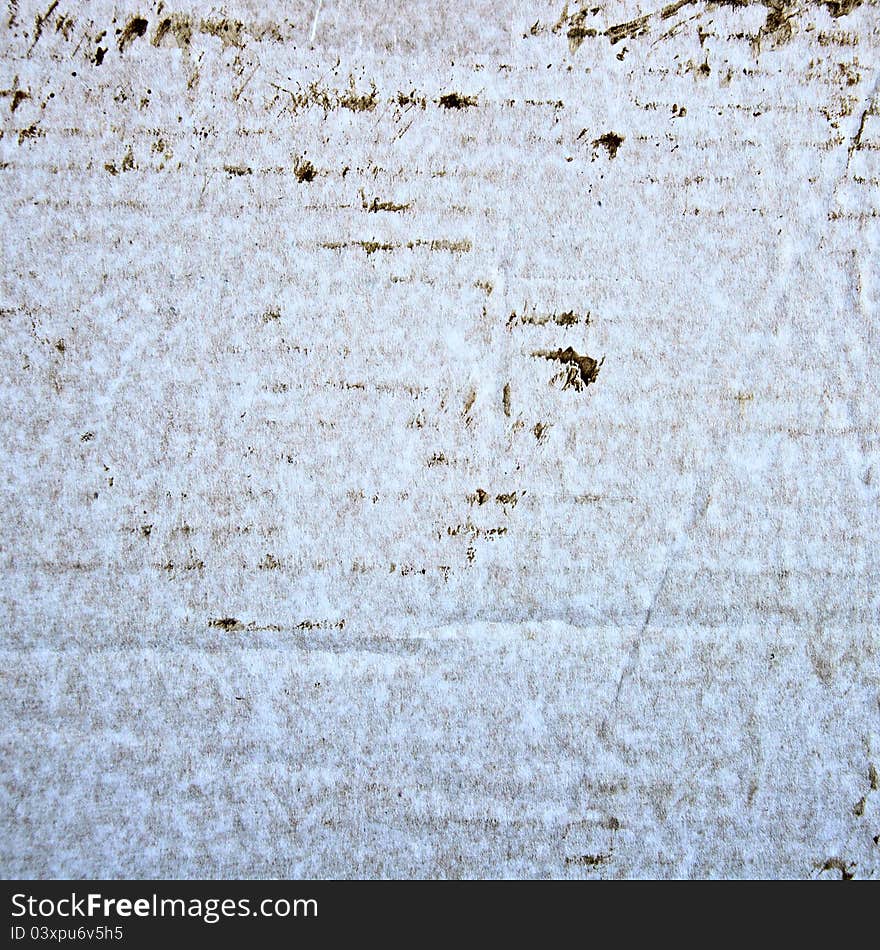 Background a texture in style grunge. The old soiled cardboard of white colour. Background a texture in style grunge. The old soiled cardboard of white colour