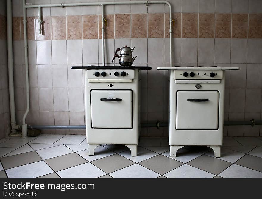 Two old style owens in a dormitory in Russia