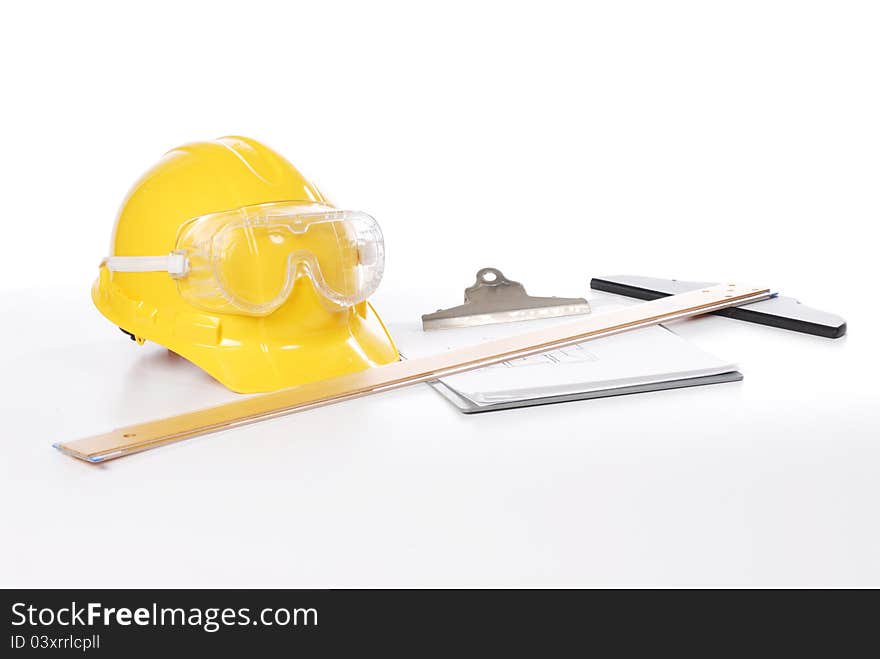 Yellow hard hat on white