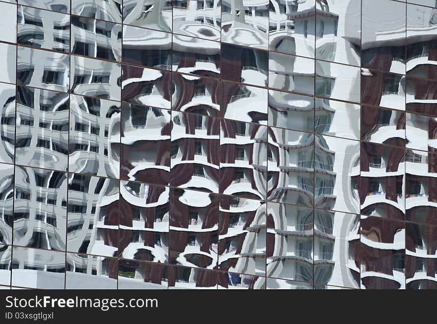 Reflection in a mirror image of the building.