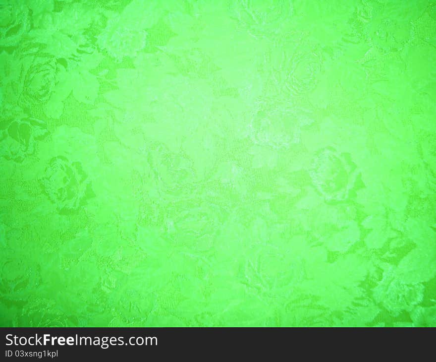 The light green pattern on the wallpaper background