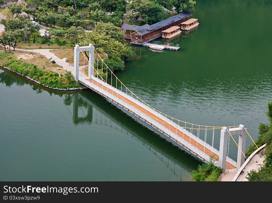 Bridge across a calm lake