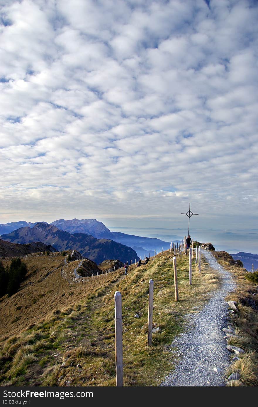 View over the misty Engelberg valley from Haldigrat mountain ridge, Nidwalden, Switzerland. View over the misty Engelberg valley from Haldigrat mountain ridge, Nidwalden, Switzerland.