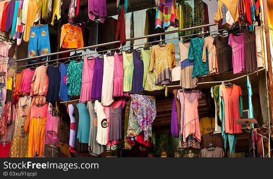 Colorful dress hanging in the market, India