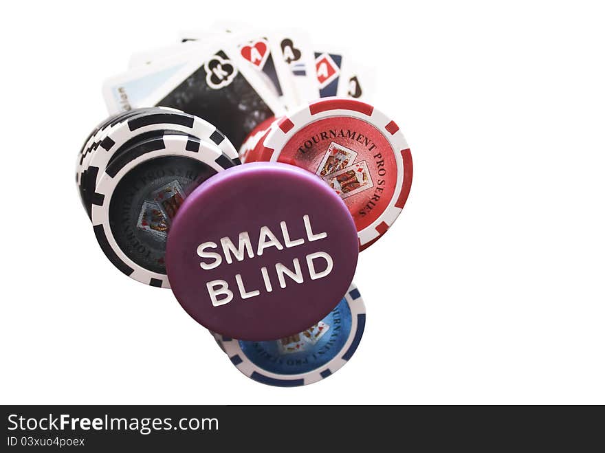 Stacks of poker chips and cards with the small blind card on top. Stacks of poker chips and cards with the small blind card on top