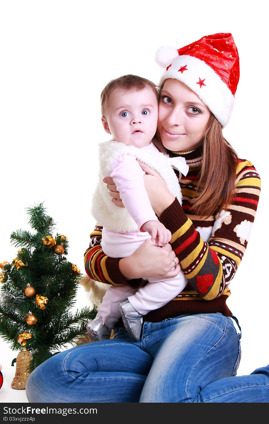 Young women with a young daughter before Christmas. Young women with a young daughter before Christmas