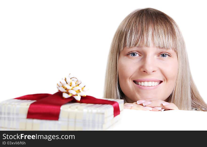 Beautiful young woman and a gift