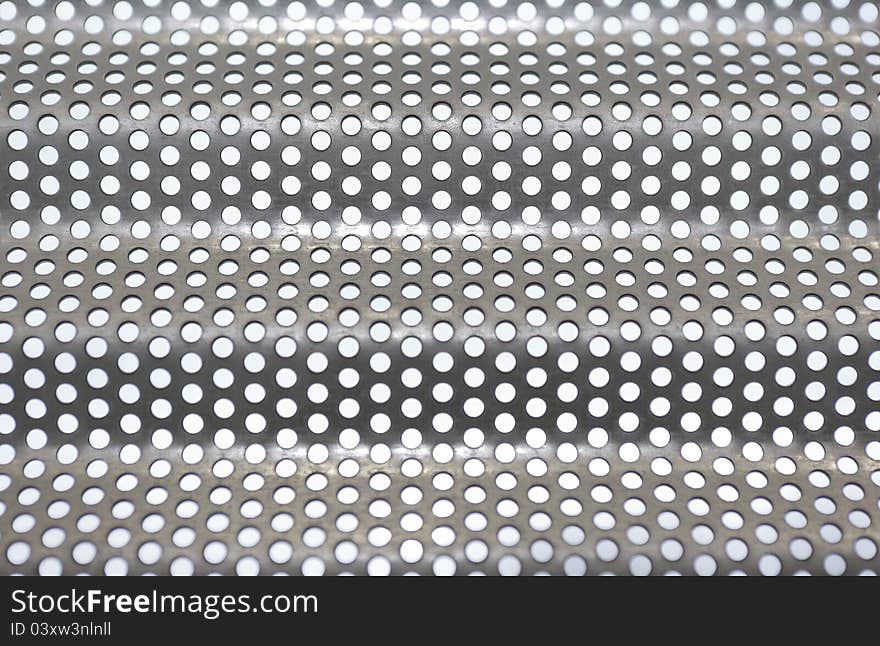 Abstract metallic wave pattern with holes. Abstract metallic wave pattern with holes