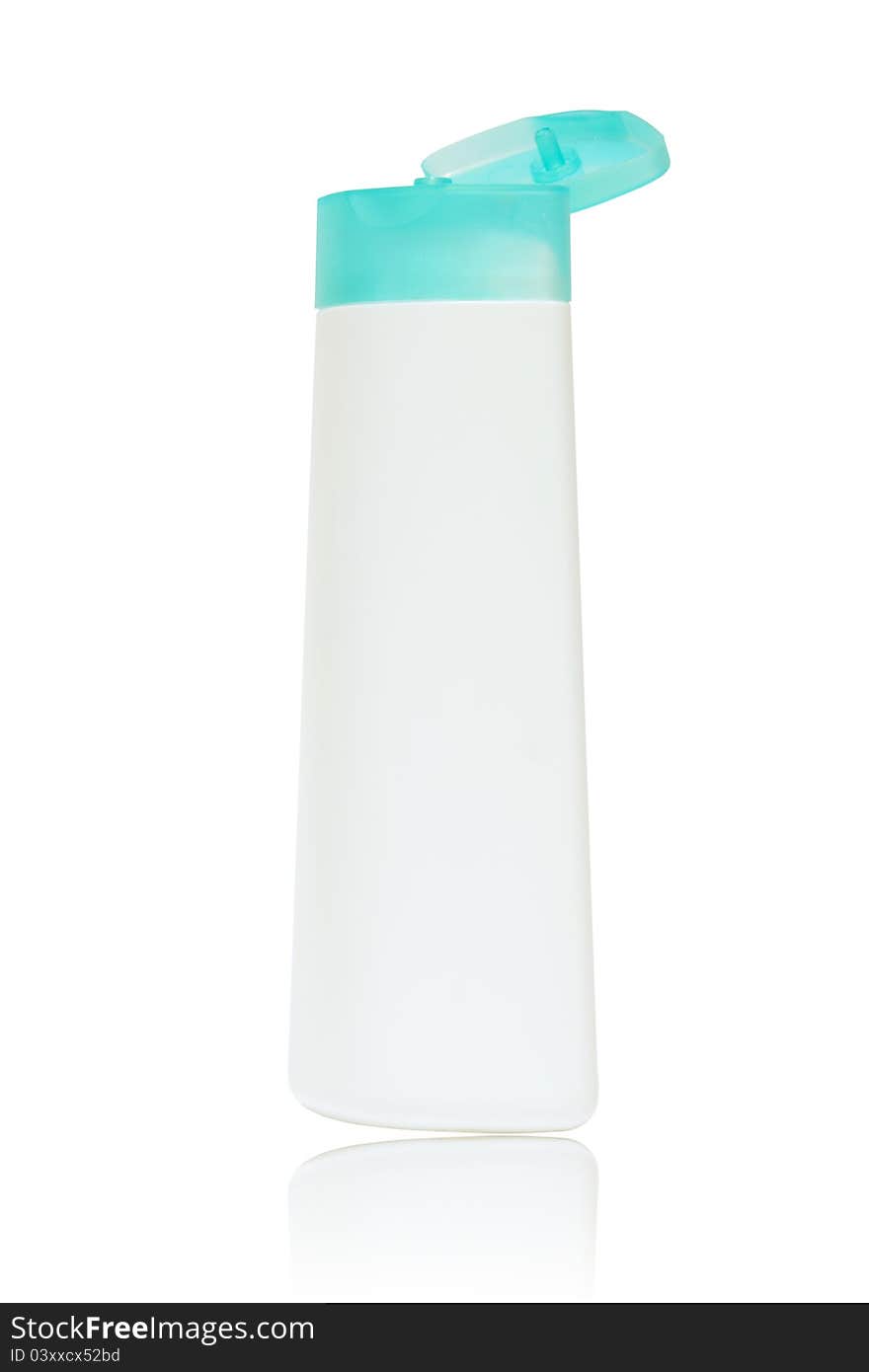 Plastic bottle with soap or shampoo without label on white background