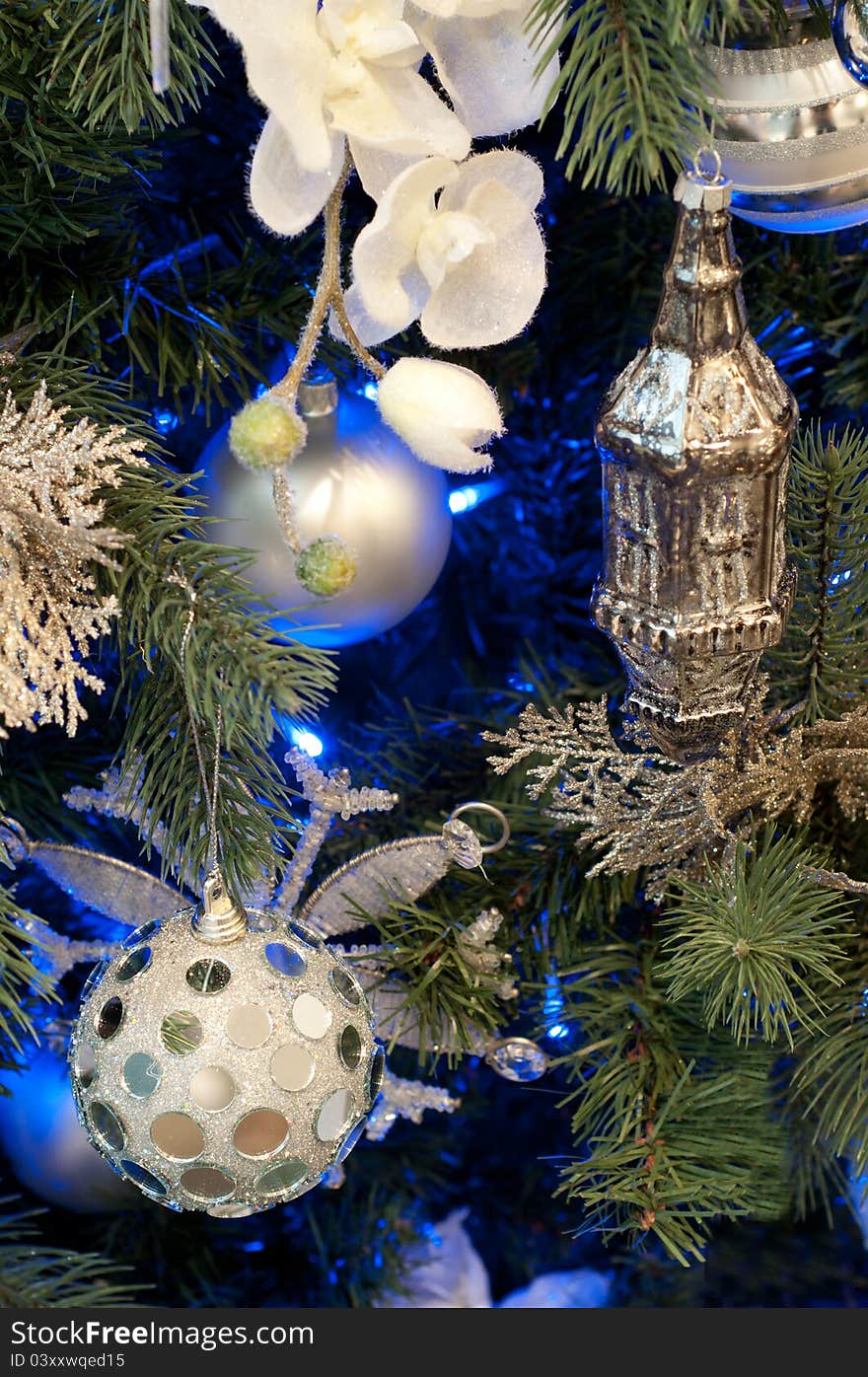 New Year's fur tree toys on fur tree. New Year's fur tree toys on fur tree.