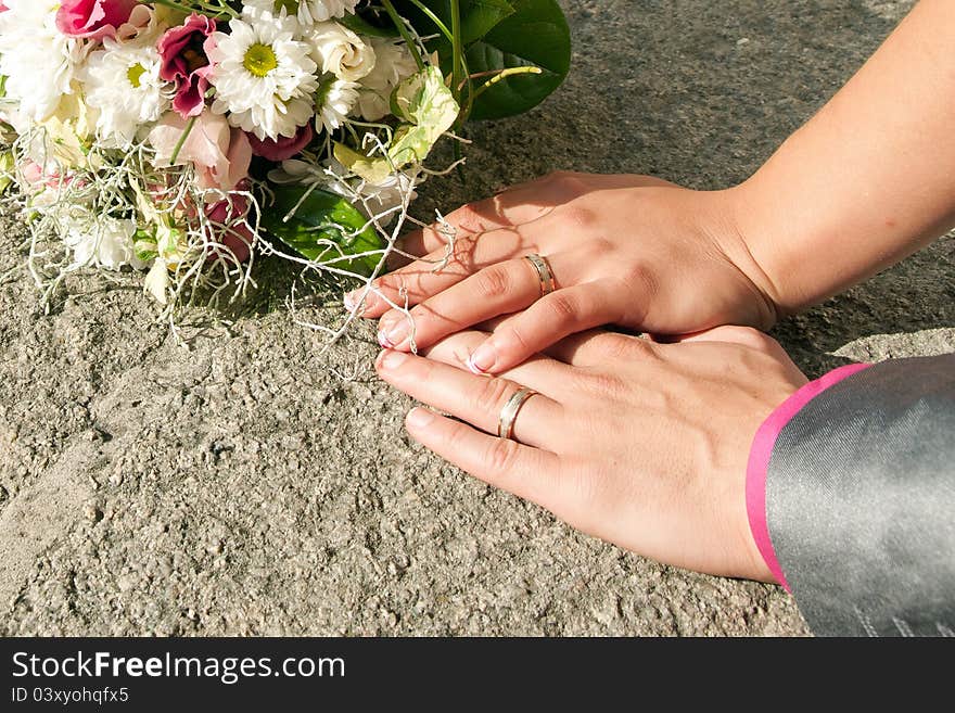 Wedding rings and beautiful flower.