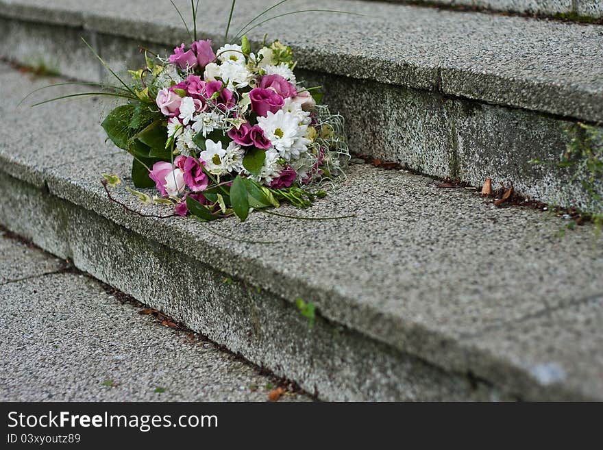 Bridal bouquet on the stone.