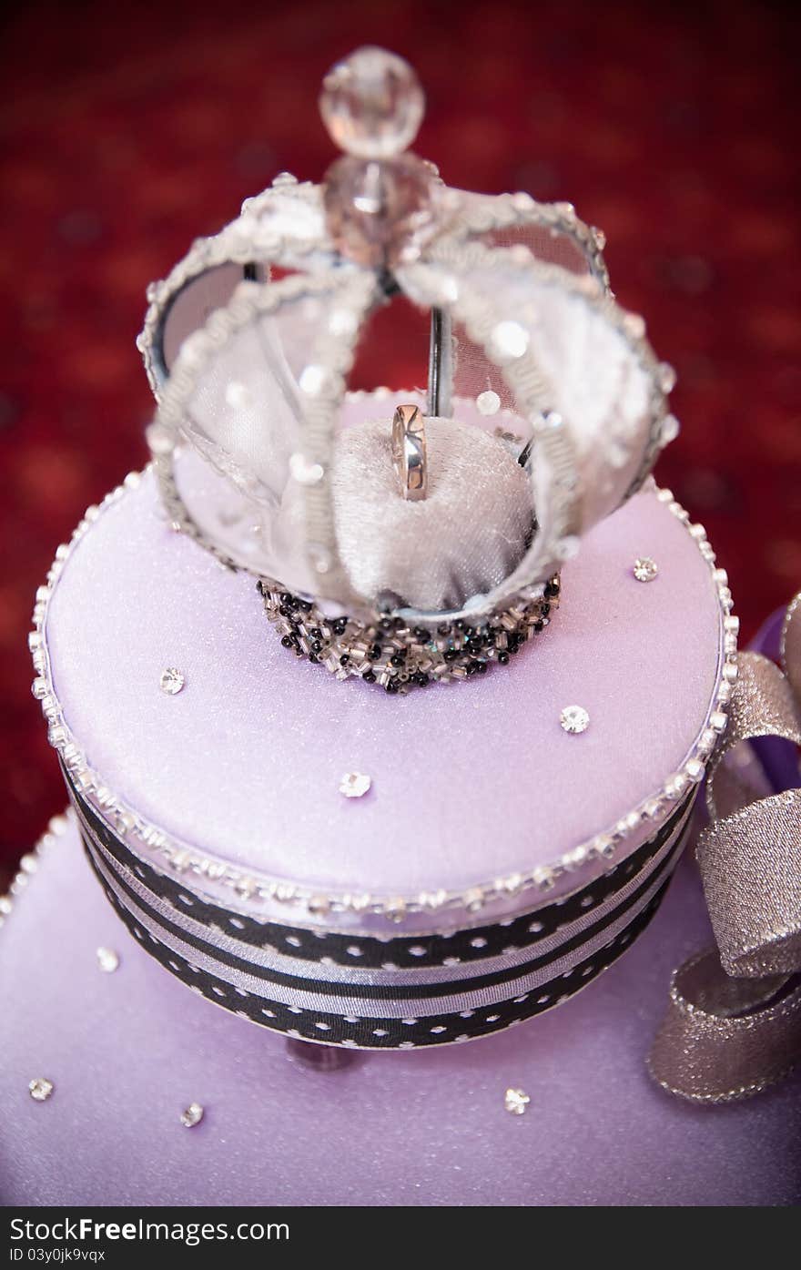 View of wedding ring on a ring cushion as a wedding gift decoration