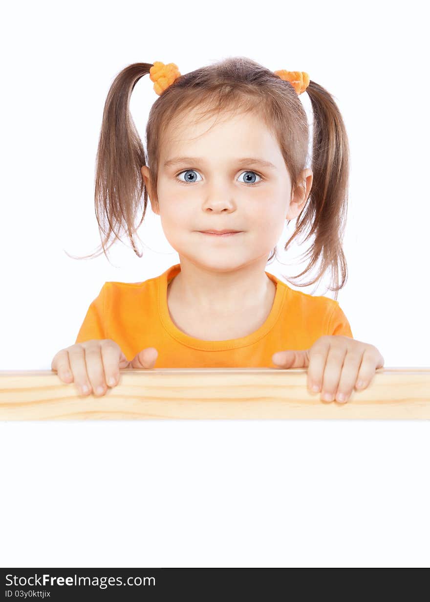 Little girl holding a billboard on a white background