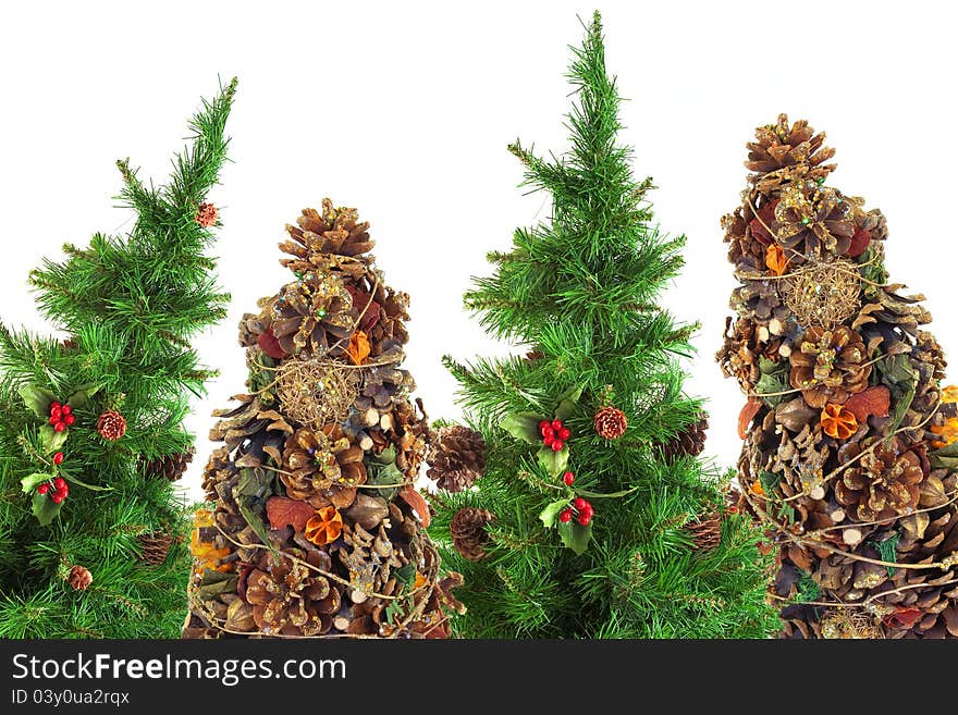 Decorated, festive Christmas trees on a white background