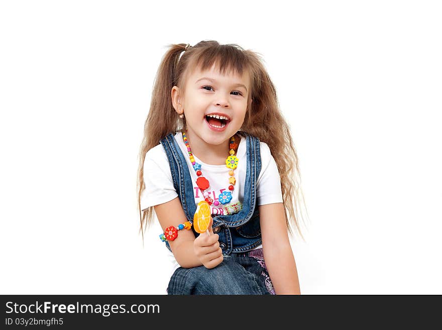 Laughing attractive girl with orange candy on stick isolated on white. Laughing attractive girl with orange candy on stick isolated on white