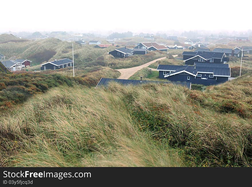 Fog over the sand dunes in Blokhus Denmark near the baech